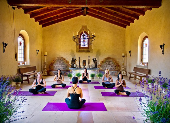 A group of woman doing yoga
