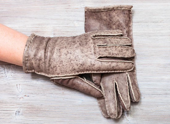 A pair of leather gloves