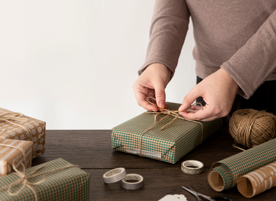 Man wrapping luxury gifts